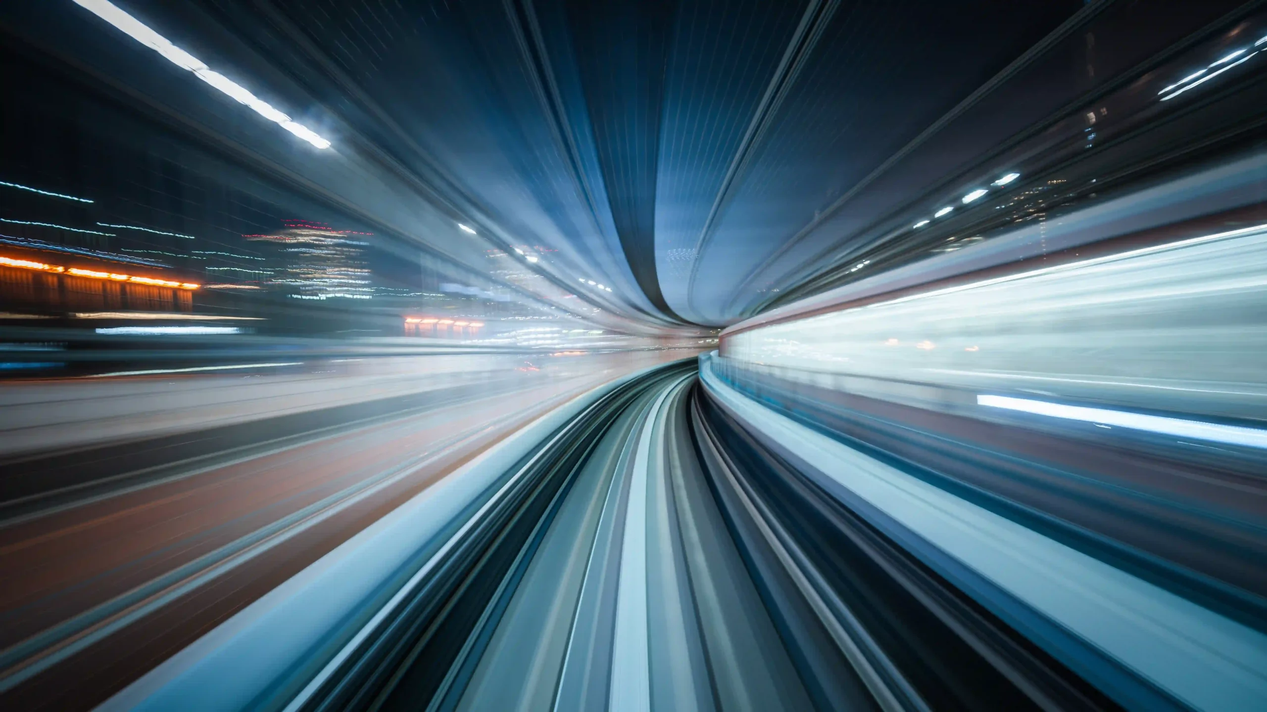 High-speed train motion blur through a tunnel.