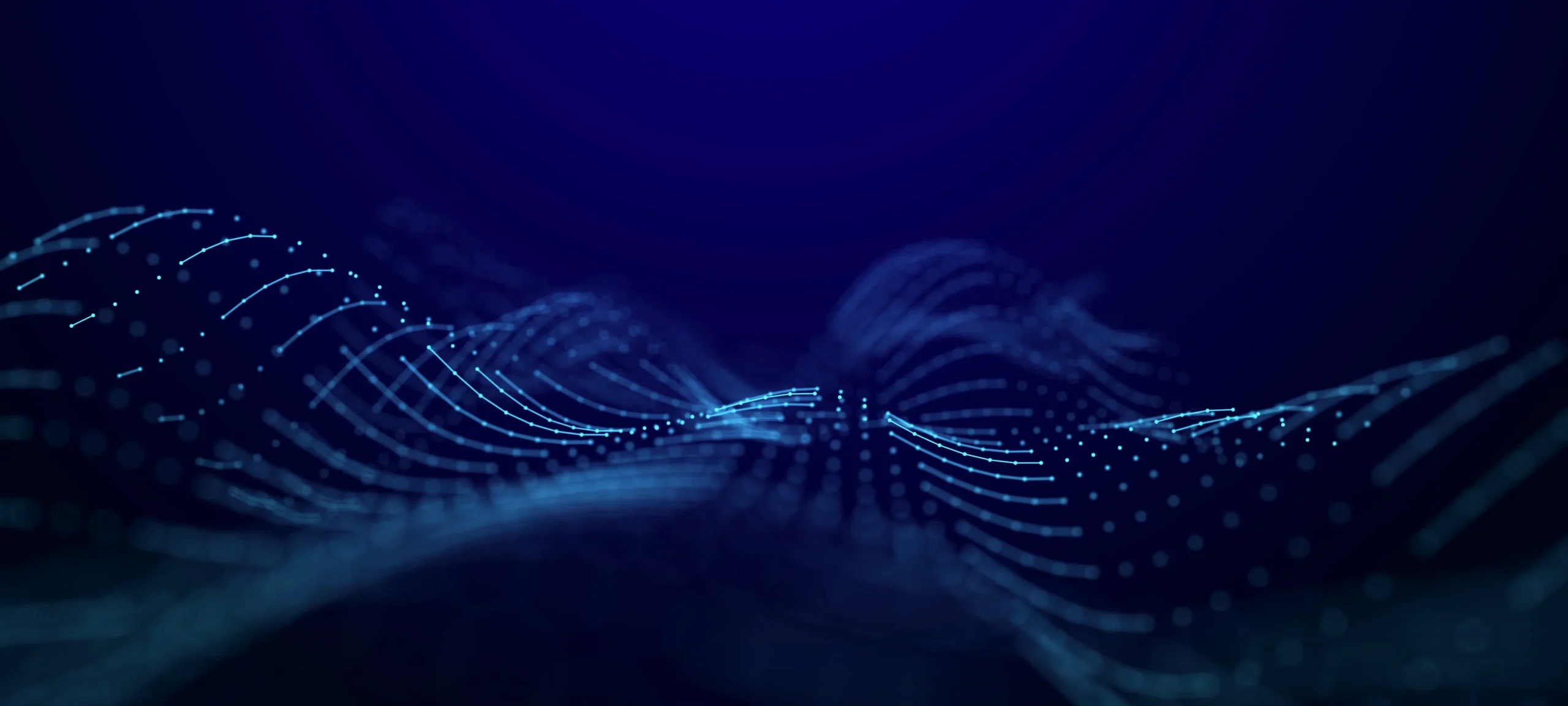 Futuristic digital waves in blue tones.